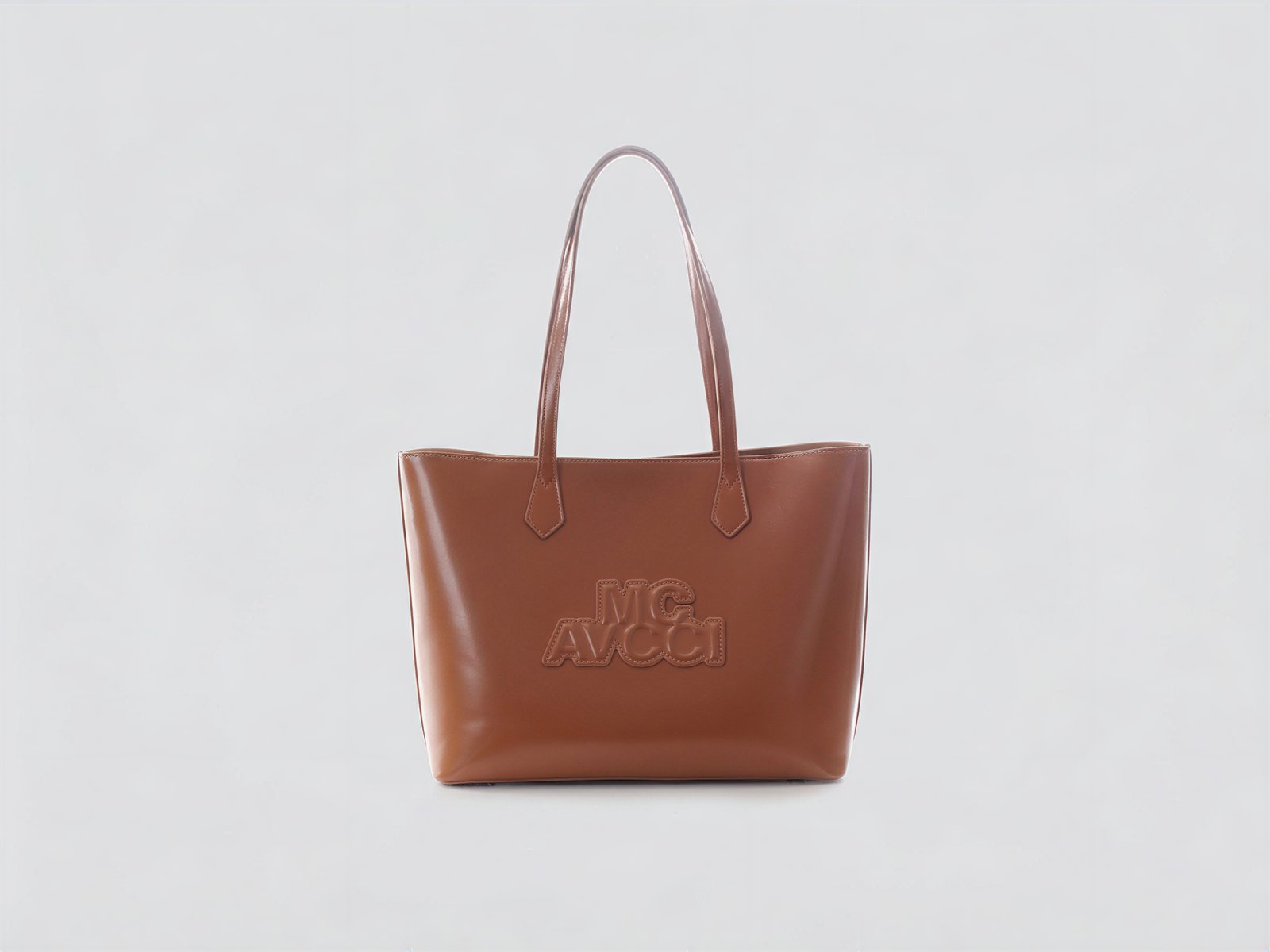 Brown leather tote bag with embossed logo